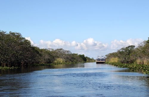 Airboat on quiet lake in Everglades National Park
