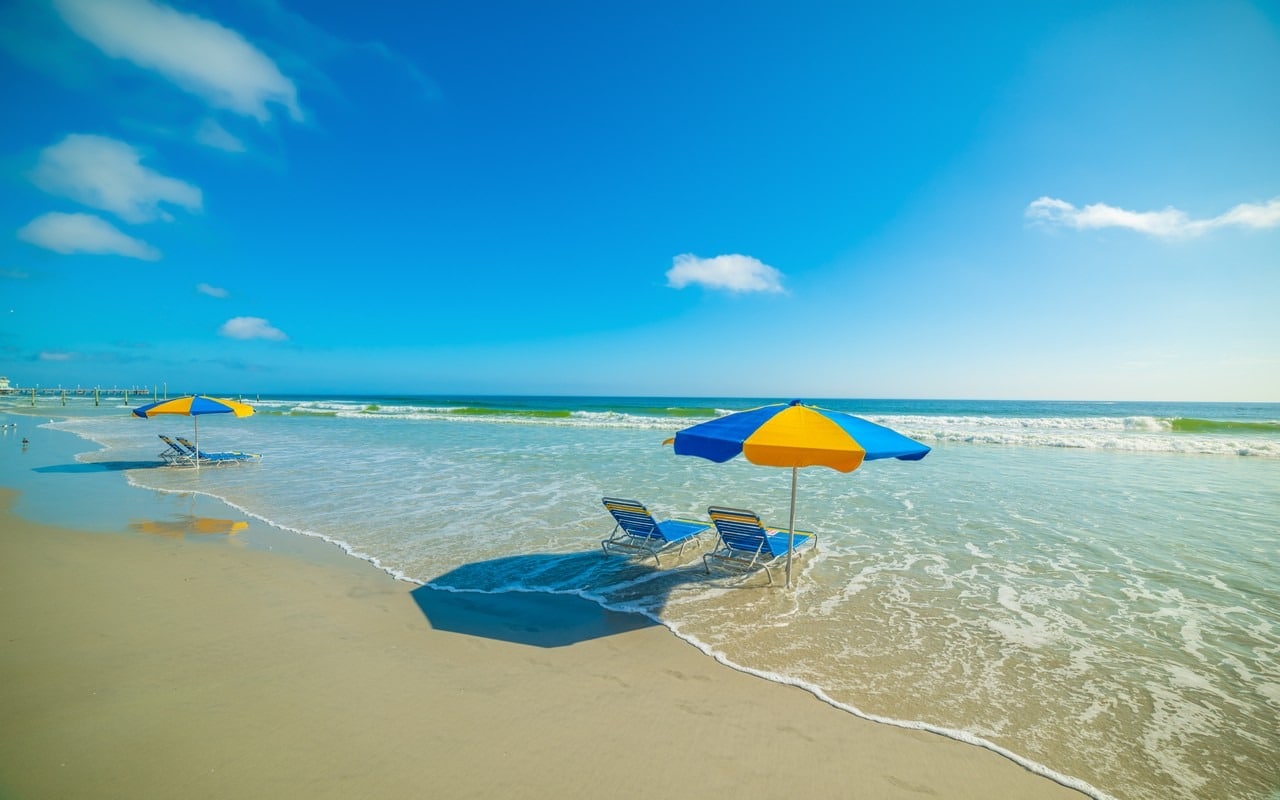 Parasols and beach chairs in Daytona Beach foreshore