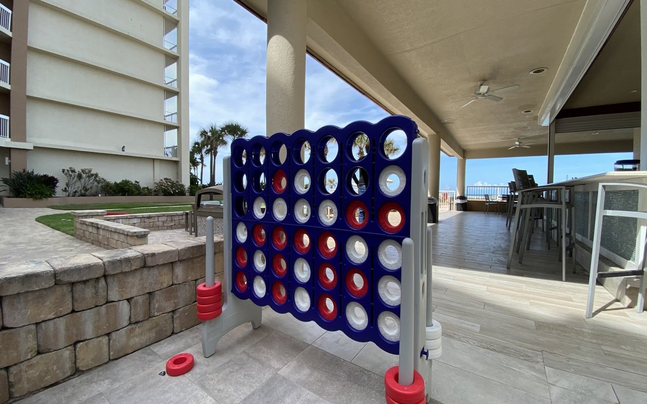 play connect 4 by the pool area in daytona beach